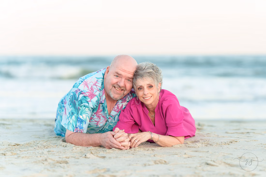 Cute older couple lying on the beach together - Huntington Beach State Park - Pawleys Island