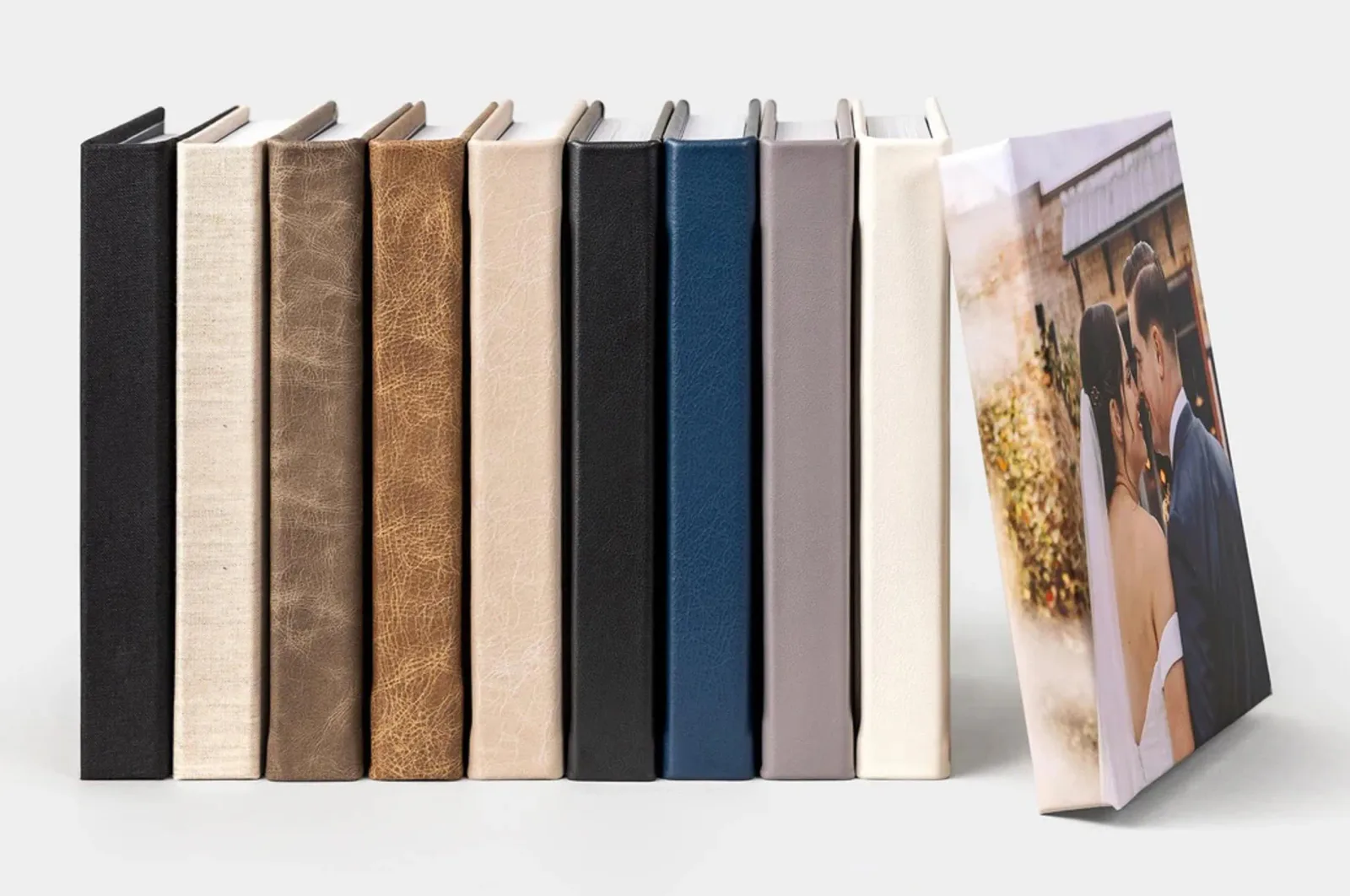 Standard album cover options in black, cream, tan, gray, navy and white leather, plus a photo cover