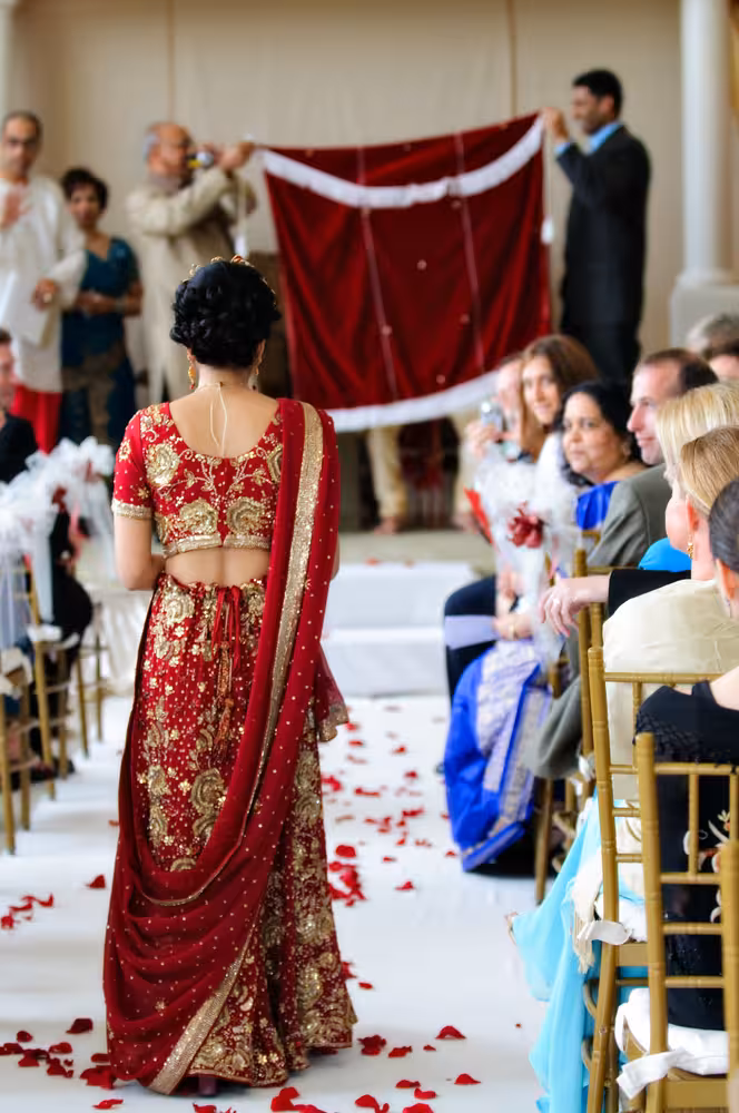 Traditional Indian Wedding at the Grande Dunes Myrtle Beach 16 Bride walking down isle at traditional Indian wedding ceremony - Grande Dunes