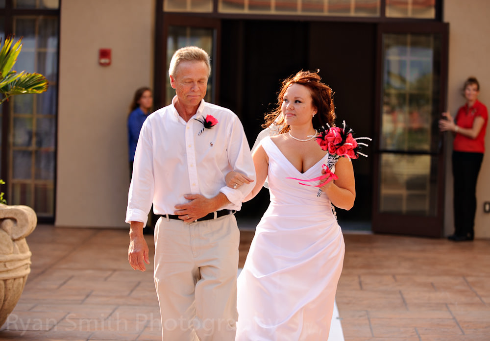 Father and Daughter walking down the isle backlit with the sun, Myrtle Beach