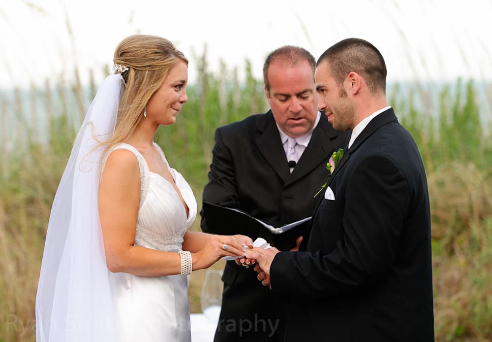 Cute expression while exchanging rings, Hilton in North Myrtle Beach