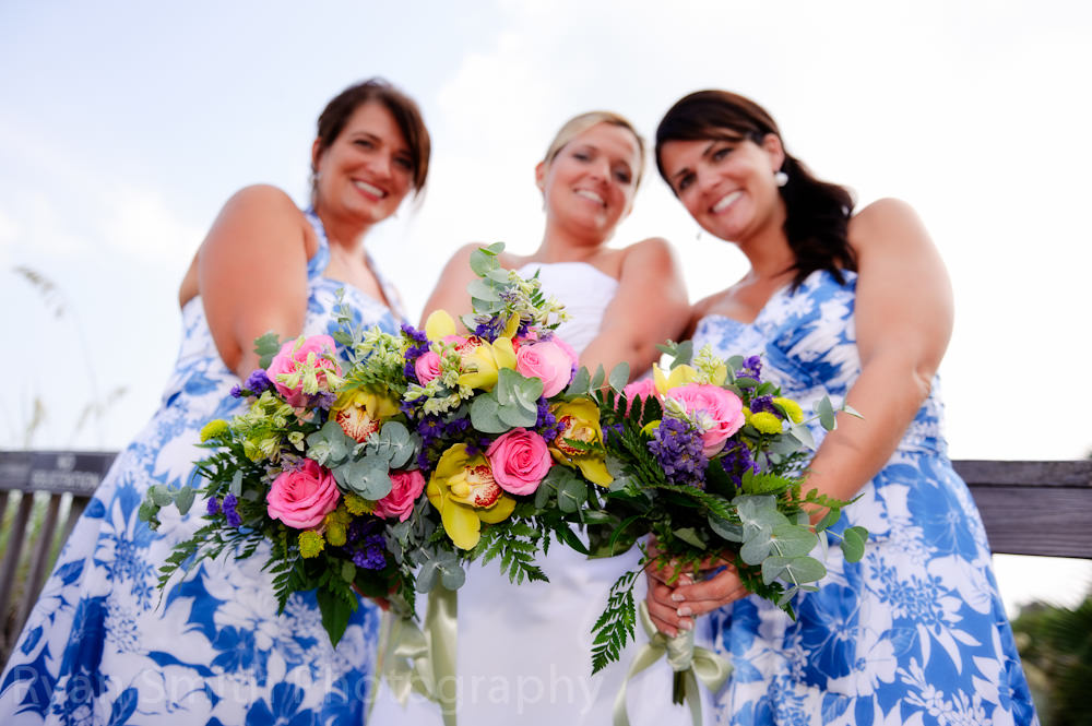 Bridesmaids with flowers in focus