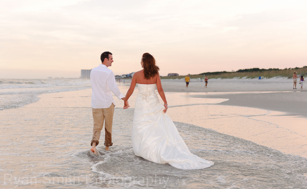 Bride and groom in the ocean - Myrtle Beach