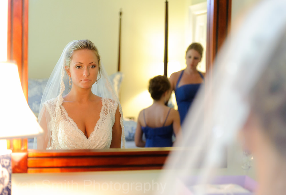 Bride looking in mirror, Pawleys Island, SC