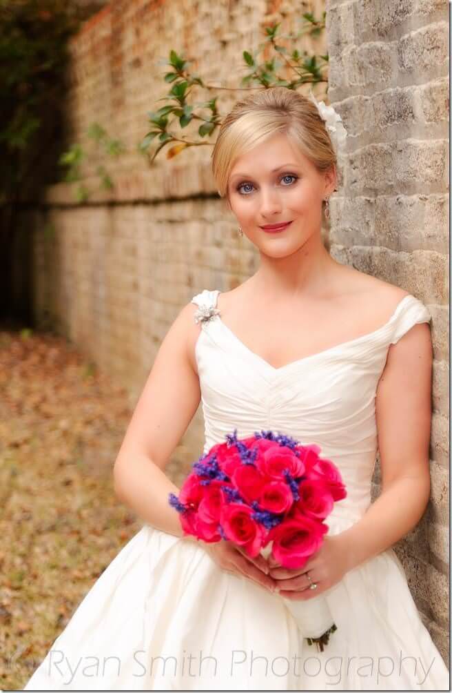 Bride leaning on old brick wall - Brookgreen Gardens - Holiday Cottage