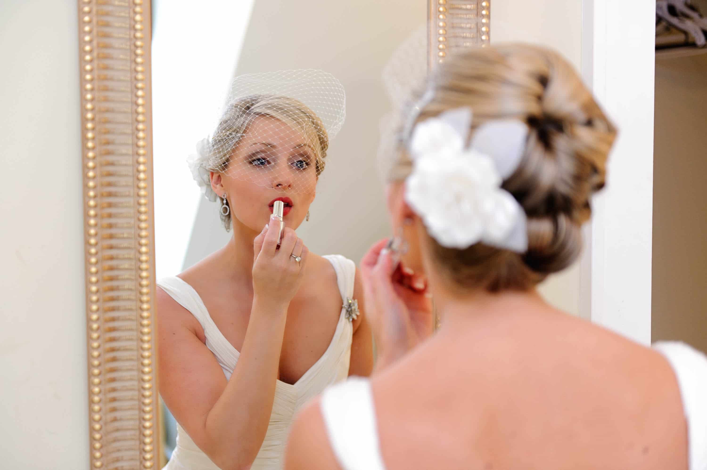 Bride getting ready in mirror