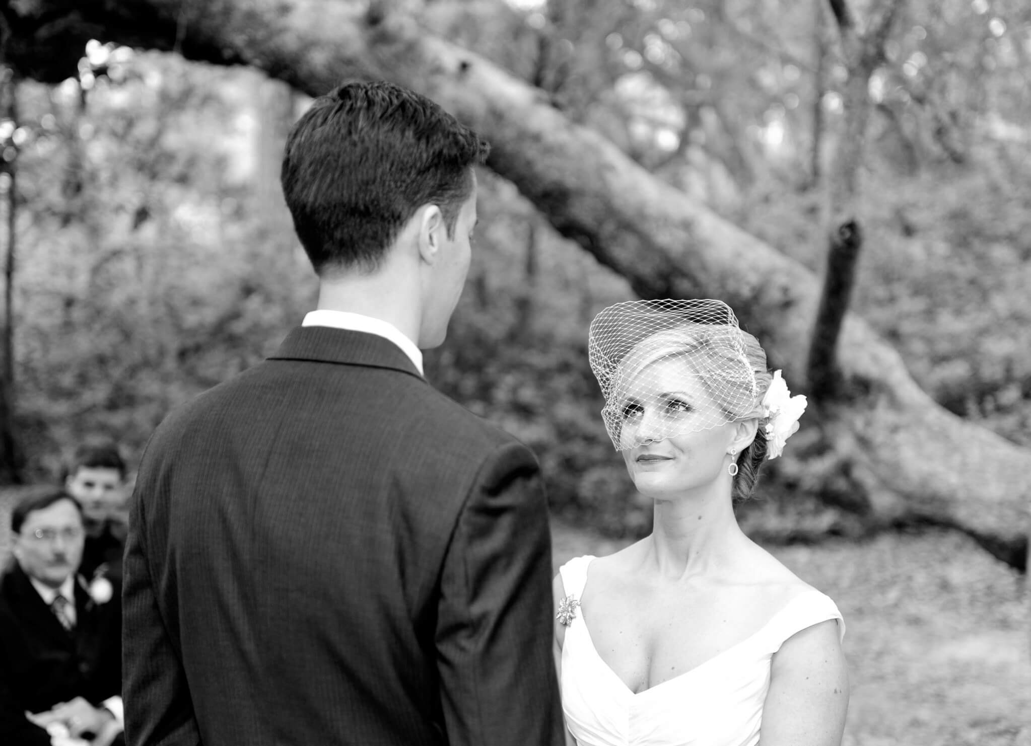 Giving the vows - black and white