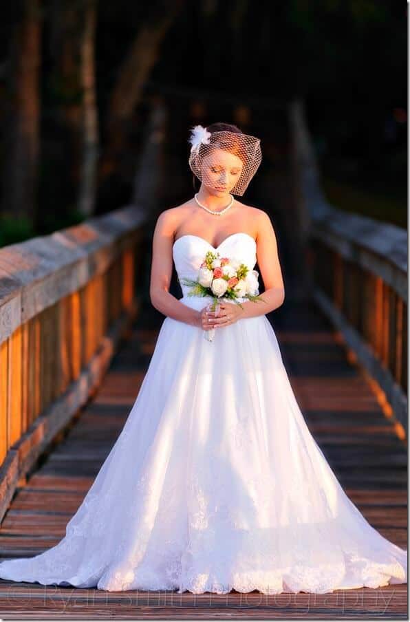 Bride standing on pier in the sunset - Intracoastal Waterway