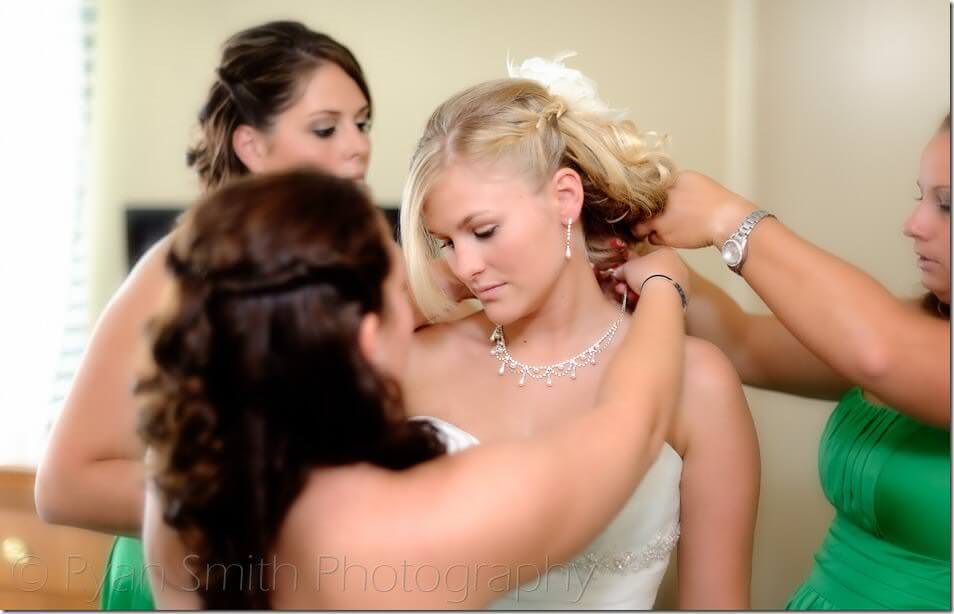Bridesmaid helping bride with necklace - Kingston Plantation - North Myrtle Beach