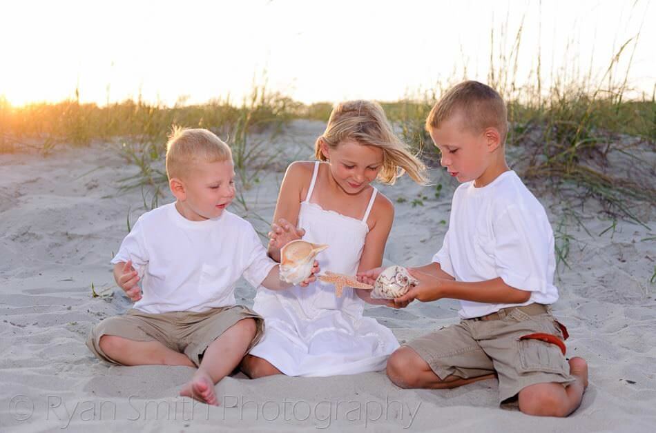 Cute kids looking at seashells - Myrtle Beach State Park