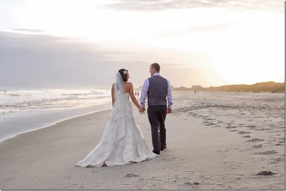 Couple walking into the sunset - Myrtle Beach State Park