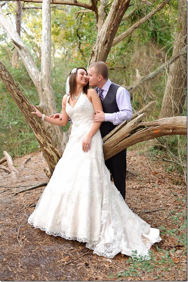 Bride and groom leaning on oak tree - MB State Park