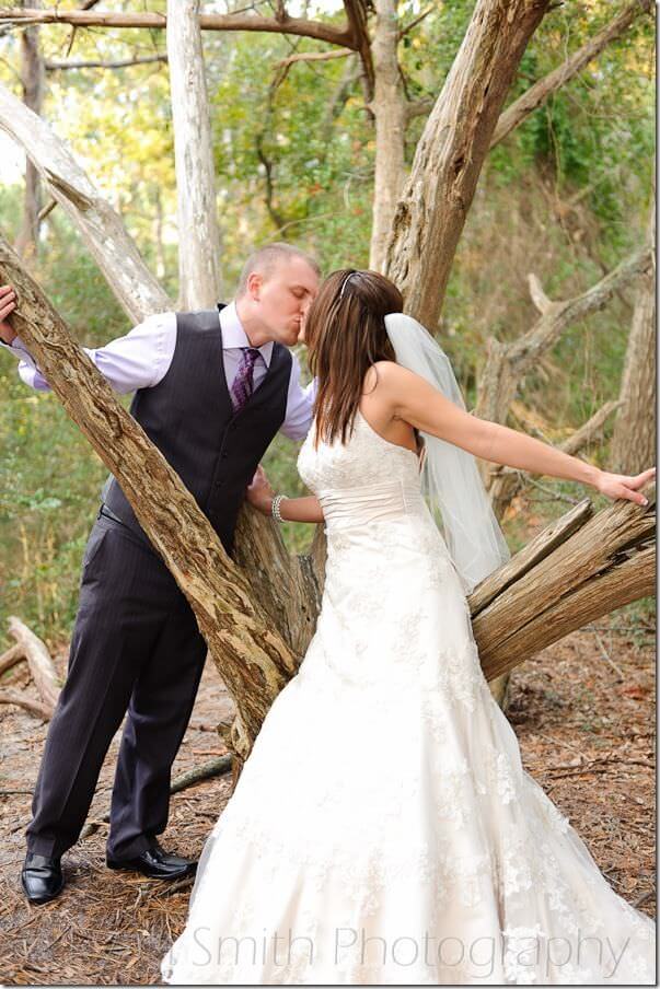 Bride and groom leaning on oak tree - MB State Park