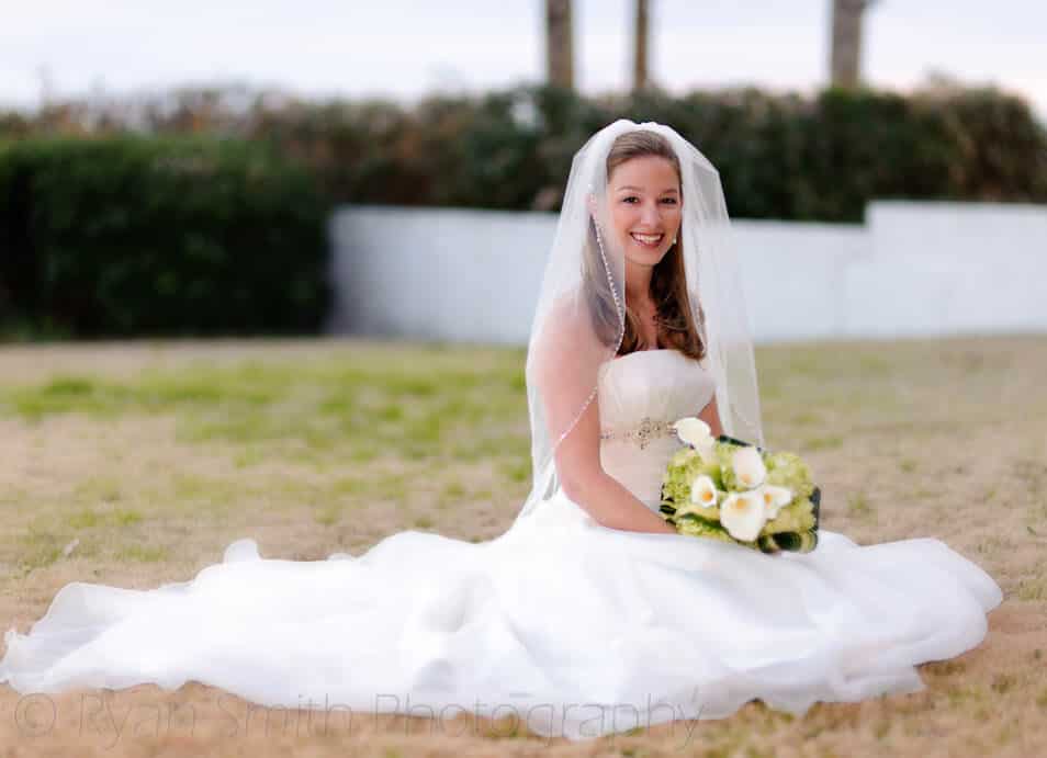 Bride sitting in the grass - Myrtle Beach