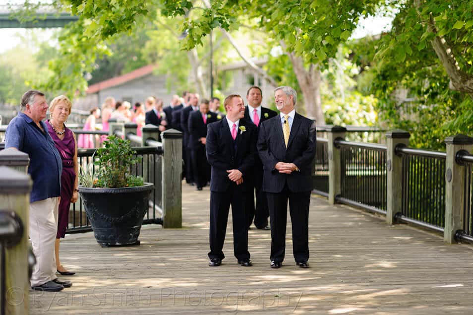 Groom and father waiting for the ceremony to begin - Conway River Walk