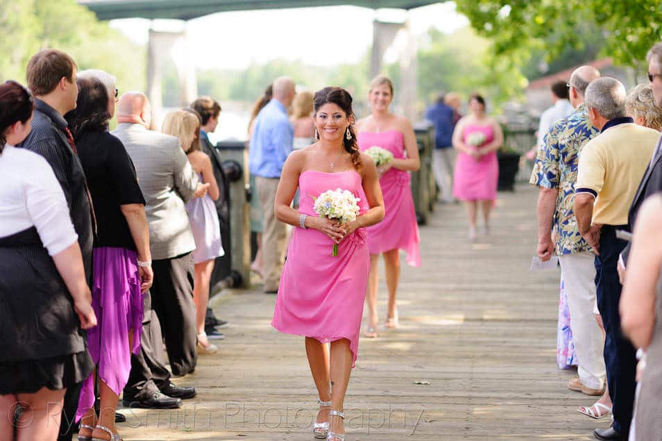 Bridesmaids walking down the isle - Conway River Walk