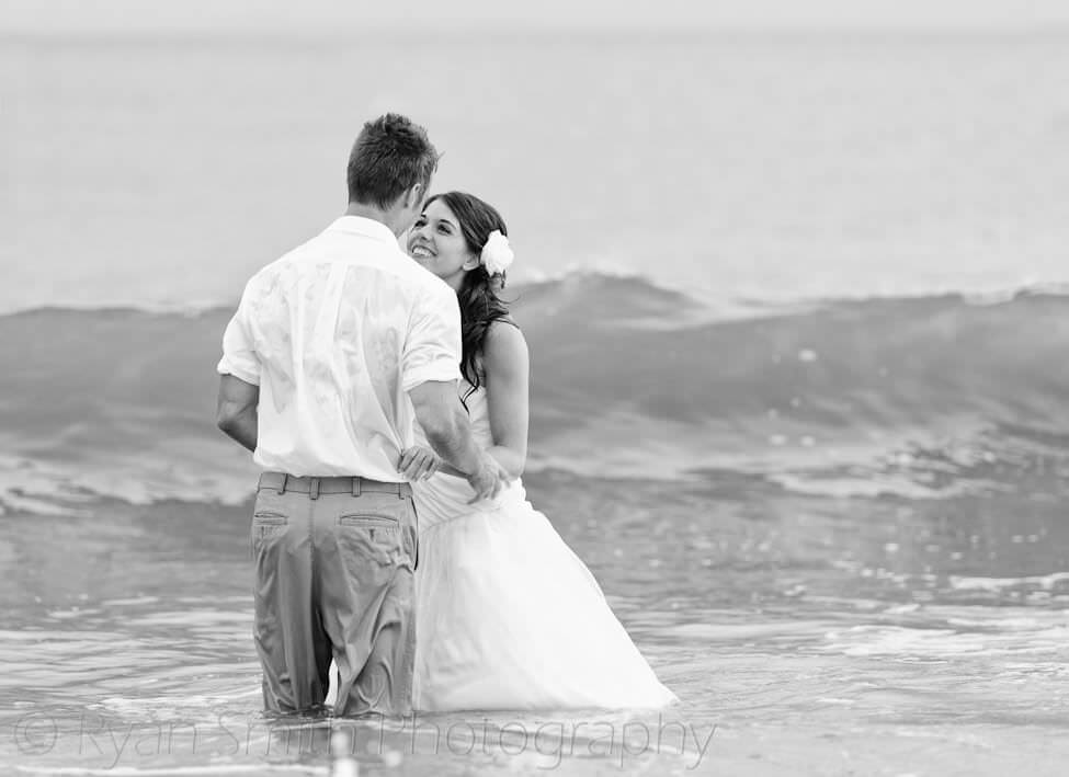 Bride and groom in the ocean - Ocean Isle