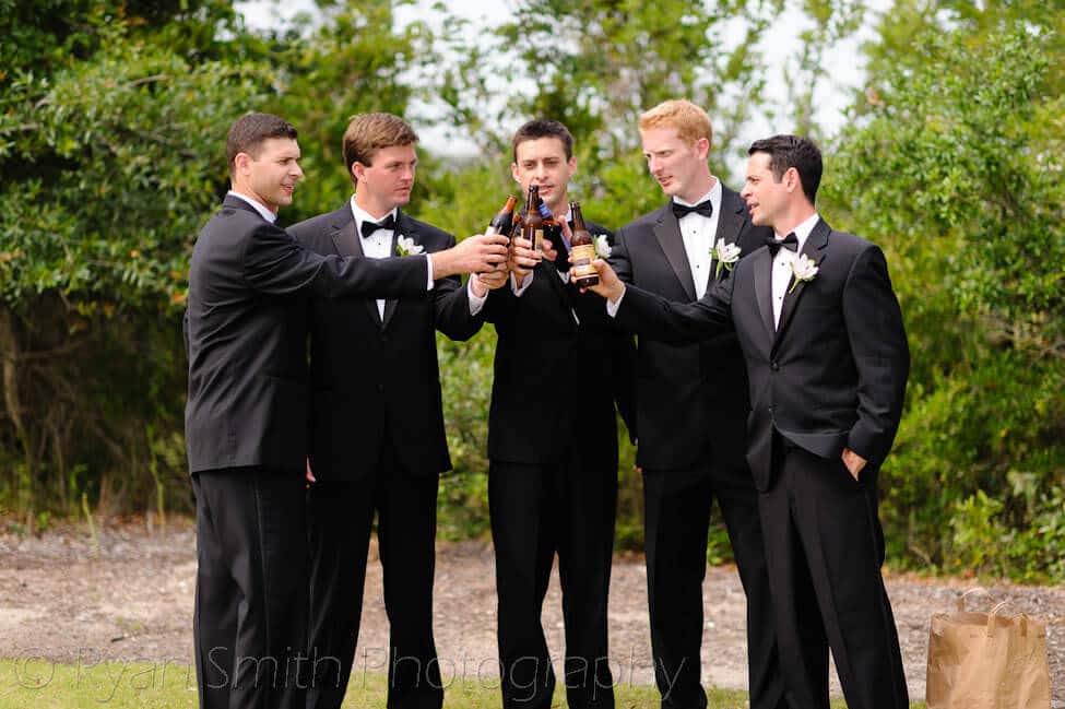 Groomsmen having a drink before the ceremony -Bald Head Island