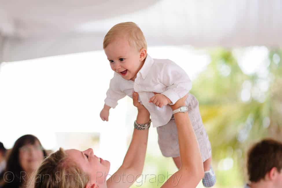 Mom having fun with baby at reception - Bald Head Island