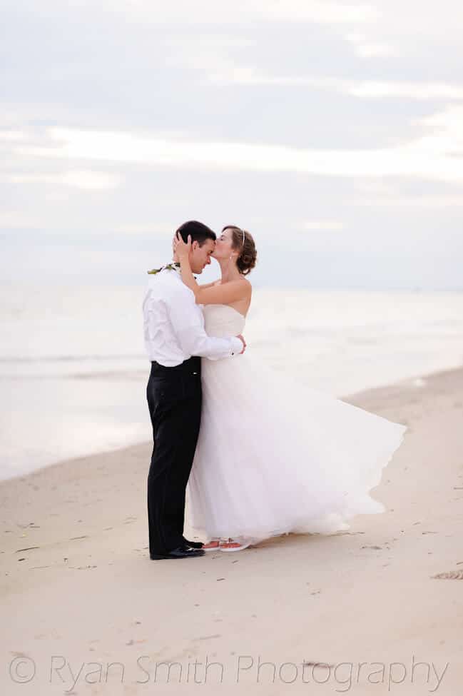 Bride kissing groom on the head - Bald Head Island