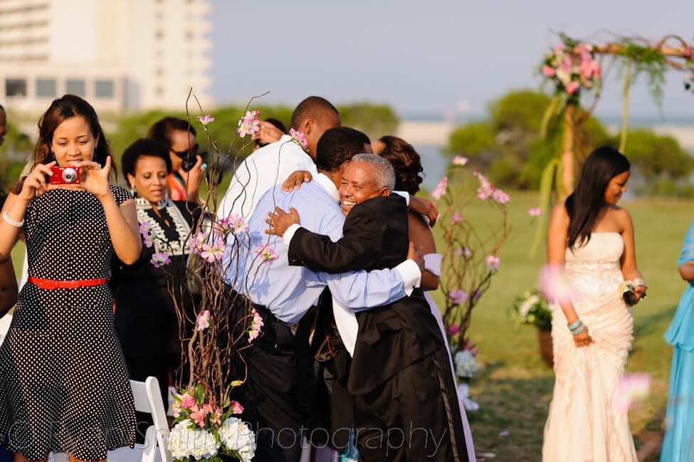 Dad getting a hug after ceremony