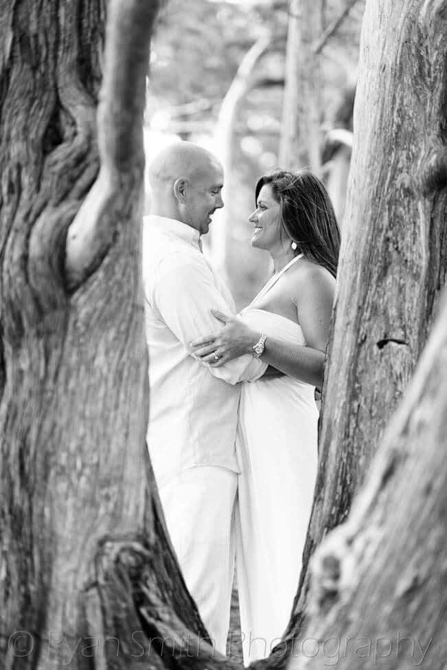 Taking an engagement portrait through the oak tree - Myrtle Beach State Park