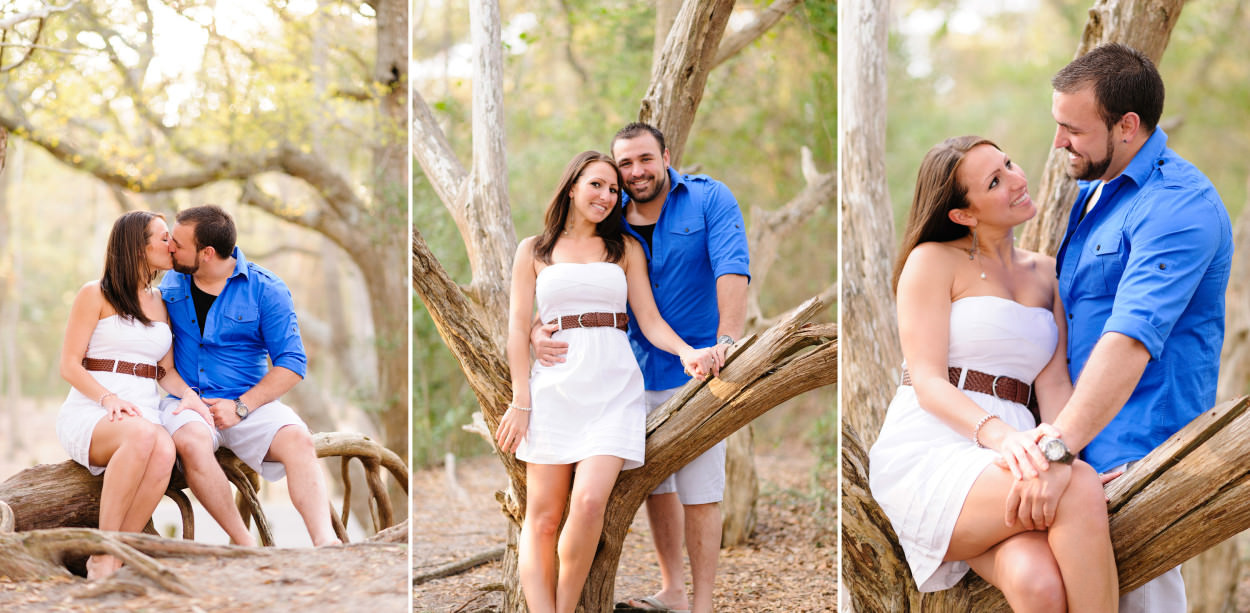 Engagement portrait - Gril getting a kiss from behind sitting in old tree