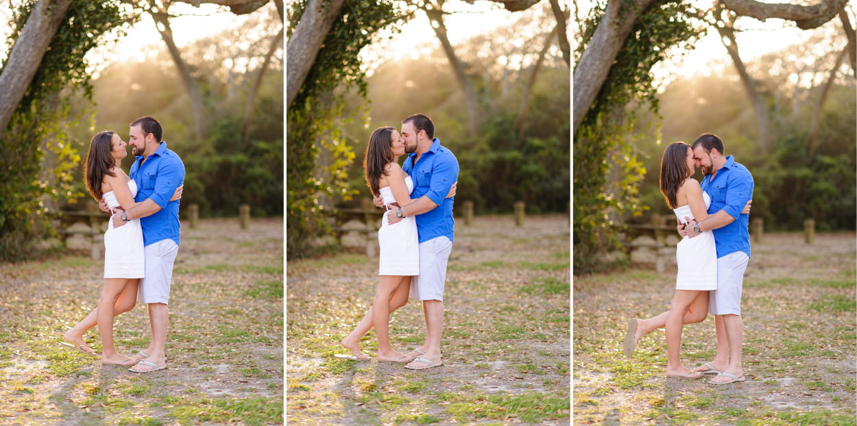 Engagement portrait backlit by rays of sunlight through the trees