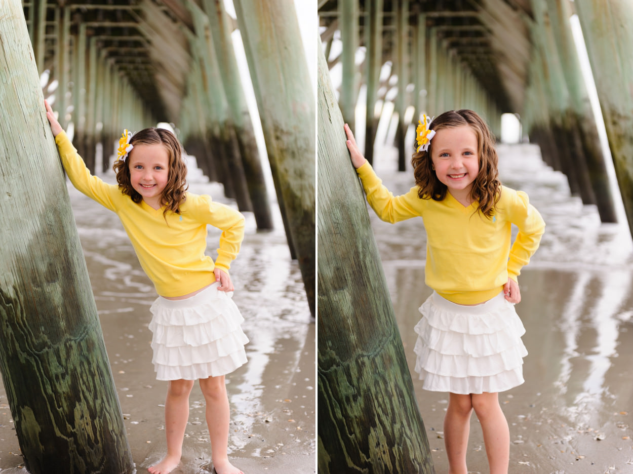 Cute portraits of little girl under the pier