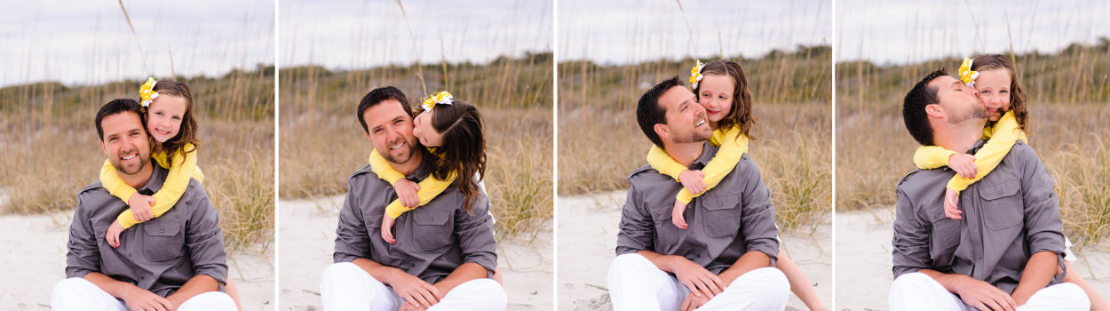 Little daughter giving dad a big hug over his sholder