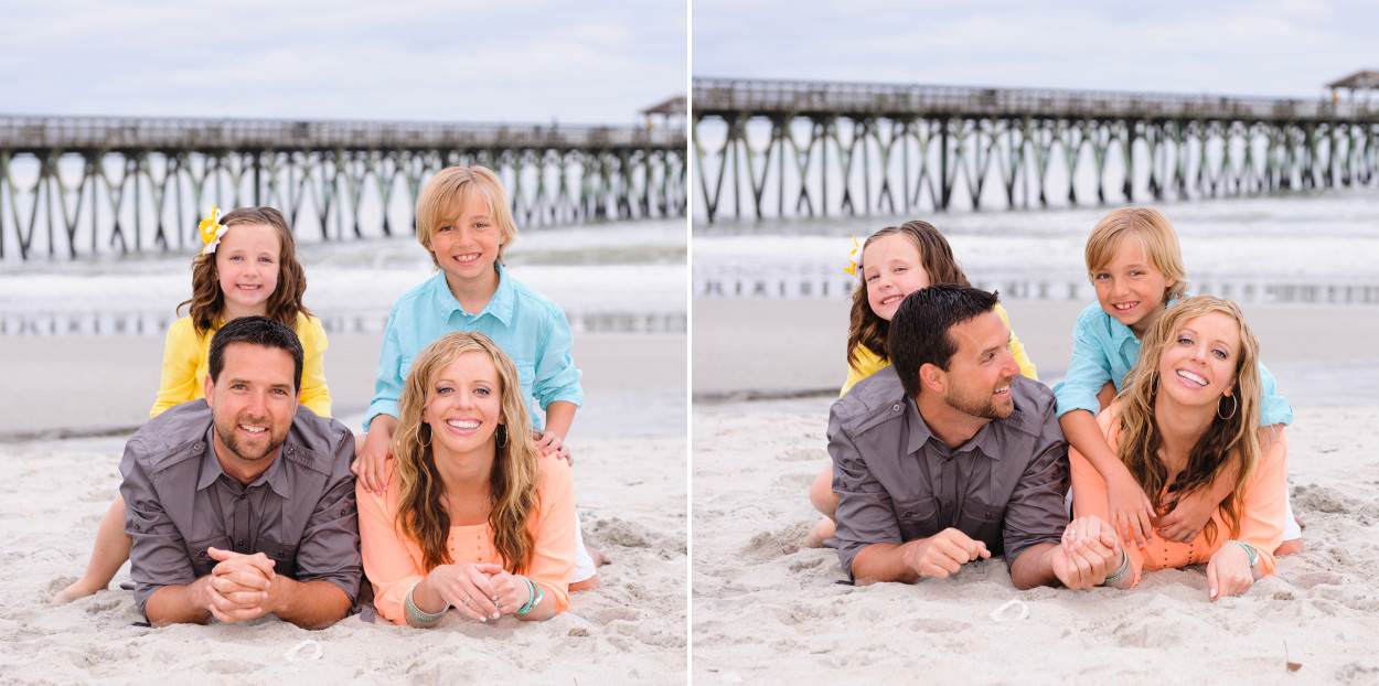 Mom and dad with kids sitting on their backs in the sand