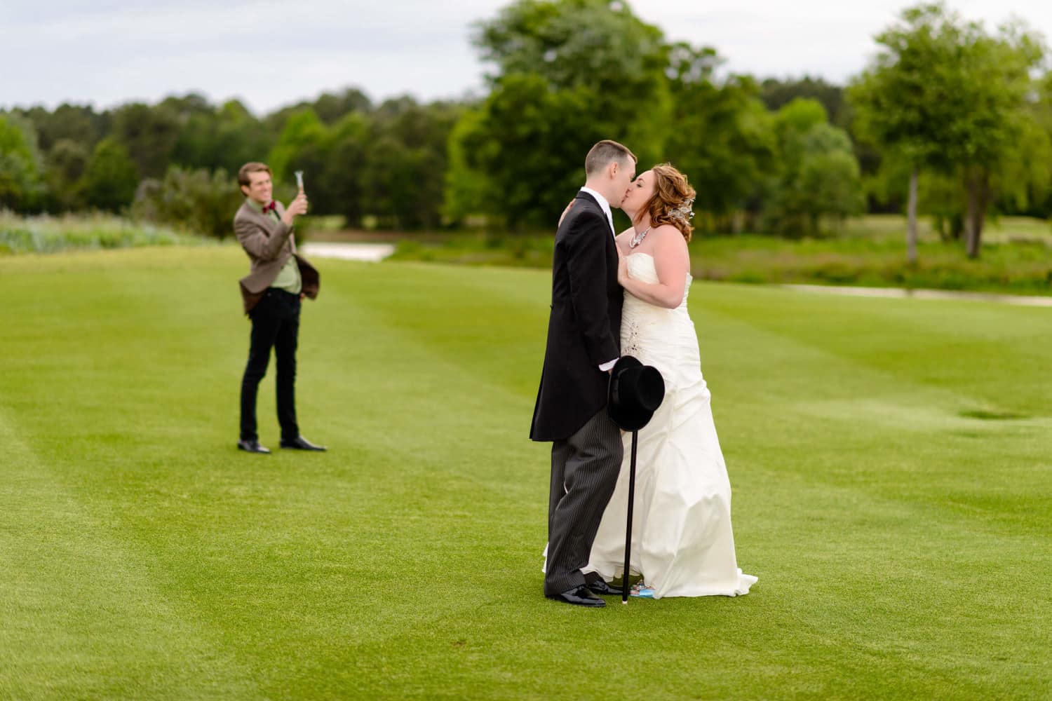 Bride and Groom getting photobombed by Dr. Who in background