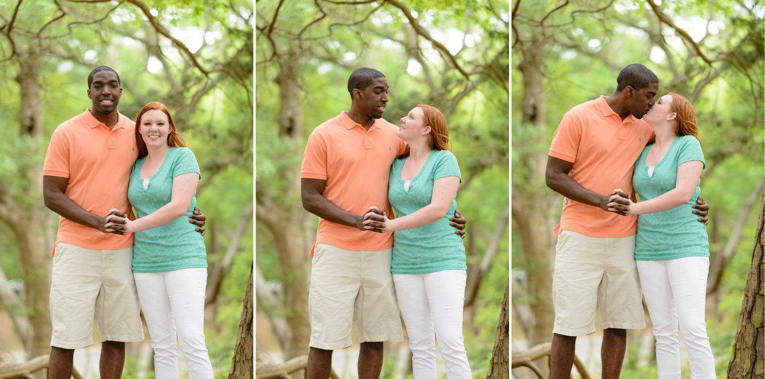 Mixed race couple kissing under the oak trees Myrtle Beach State Park