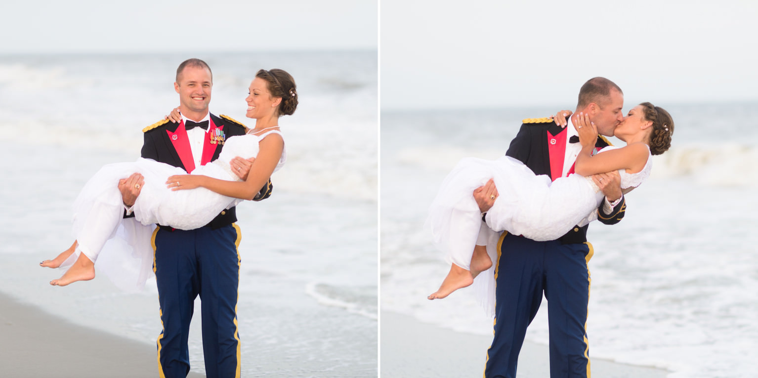 Groom holding bride in front of Ocean