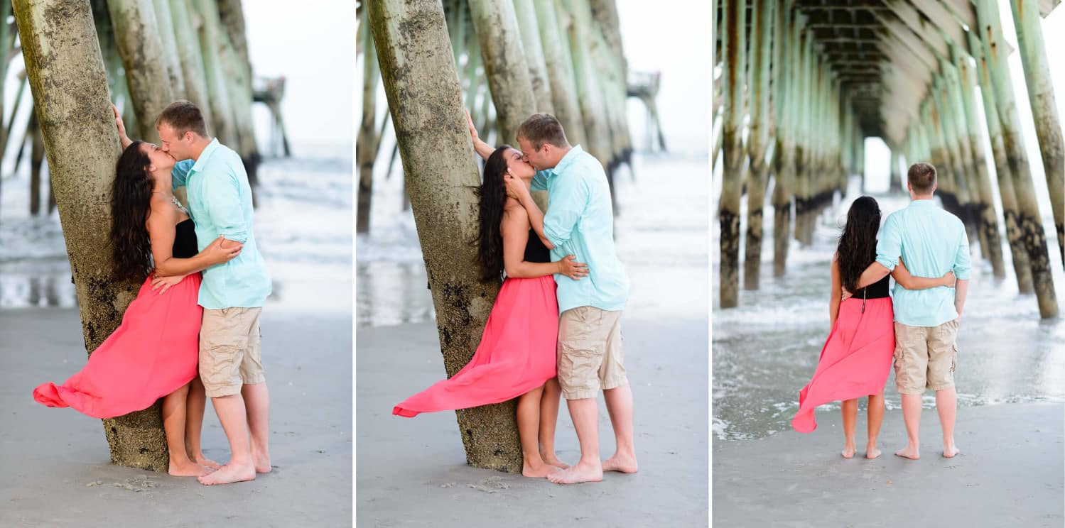 Couple looking at the ocean under the pier - Myrtle Beach State Park