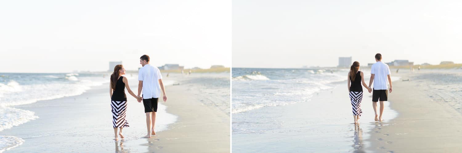 Just engaged couple holding hands walking down the beach