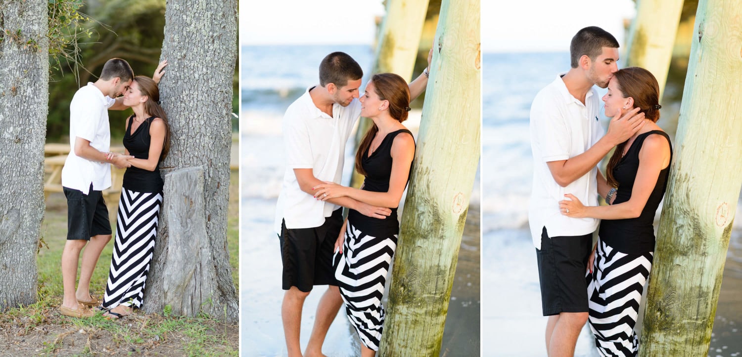 Leaning fiance against the pier for a kiss