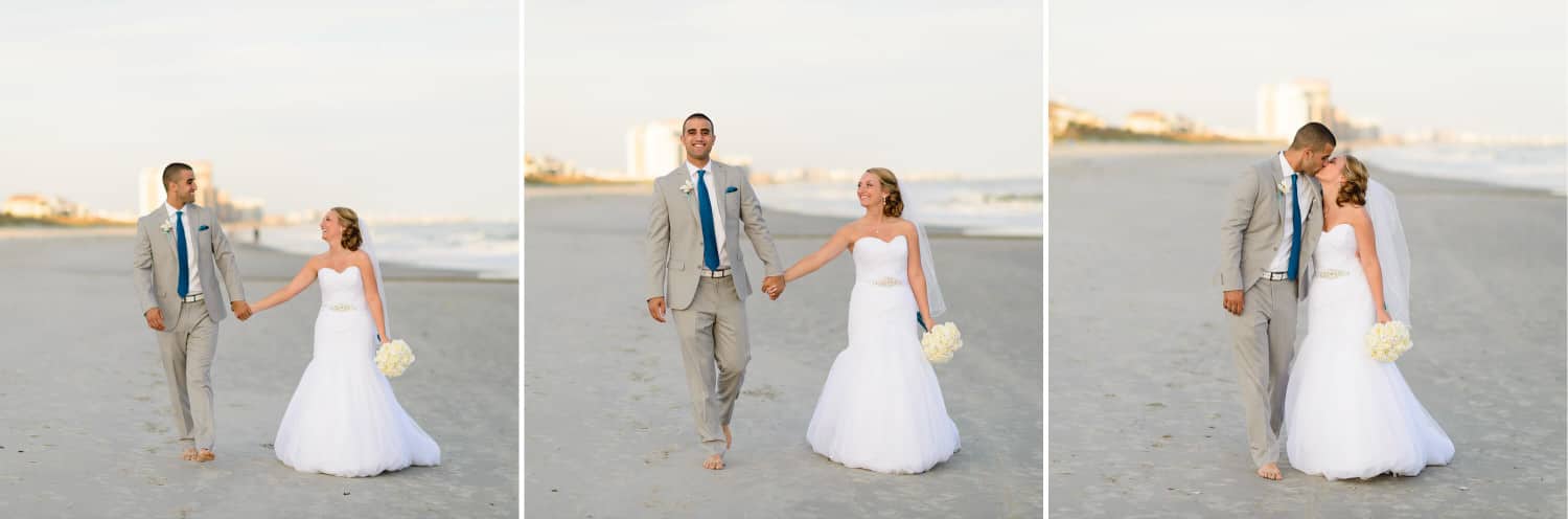 Bride and groom holding hands walking down the beach