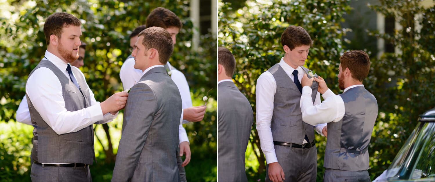 Groomsmen helping each other with flowers