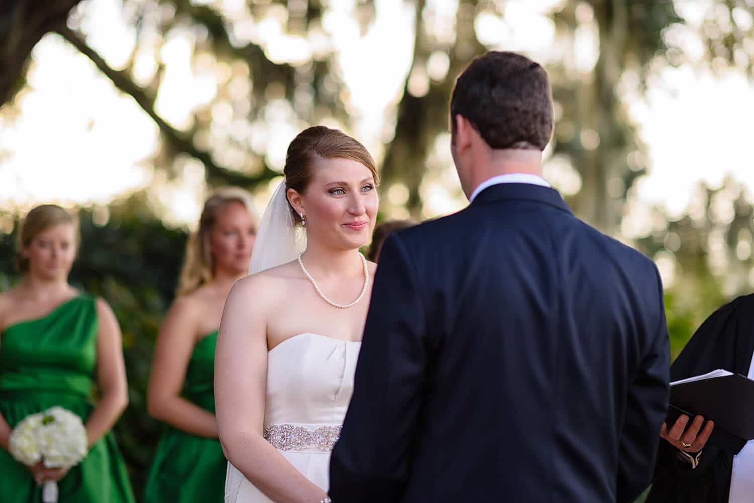 Bride looking at group with beautiful bokeh