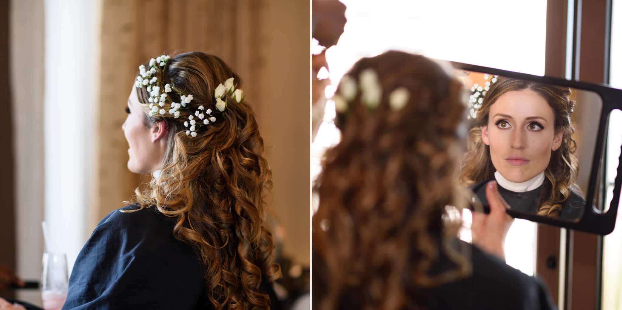 Bride checking out her hair in the mirror