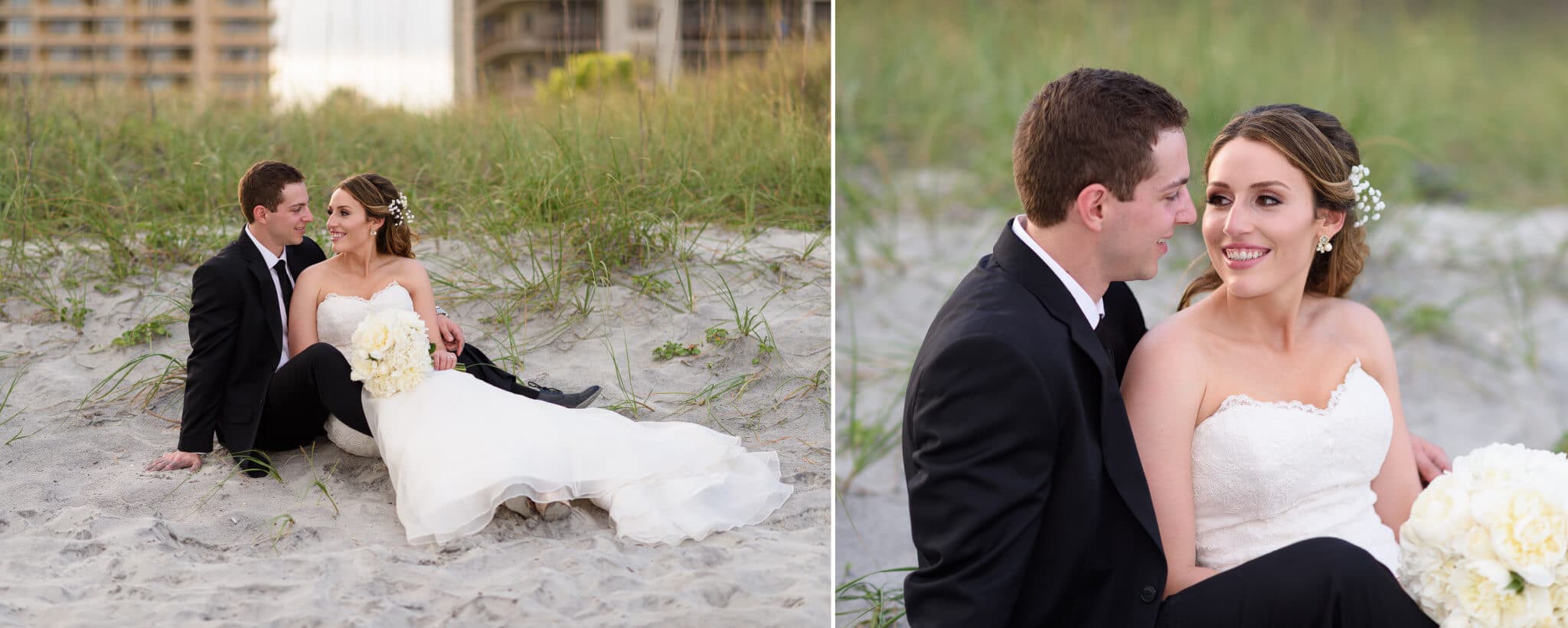 Bride smiling at groom sitting in front of the dunes