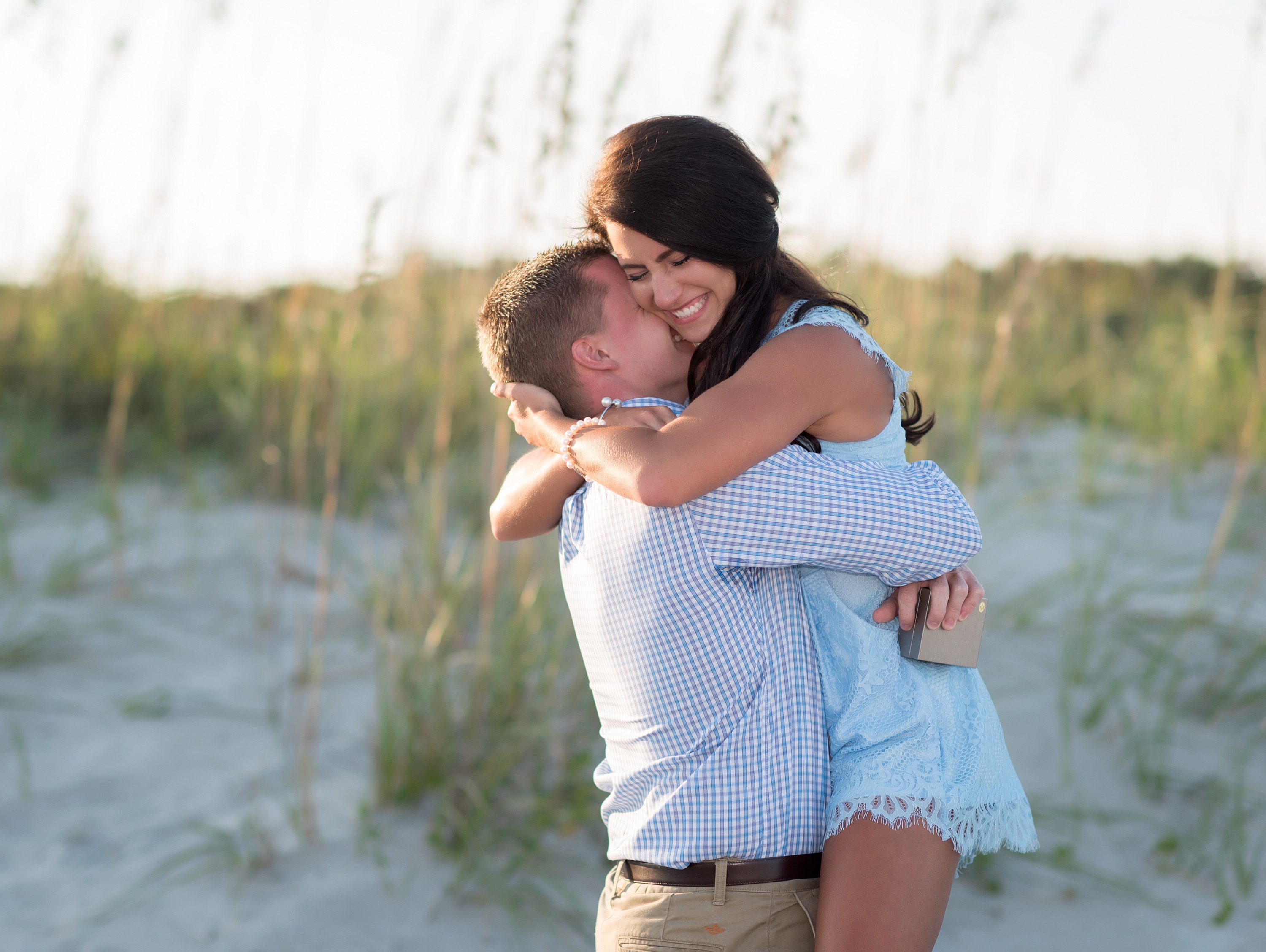 Guy getting a really big hug after surprise proposal - Myrtle Beach State Park