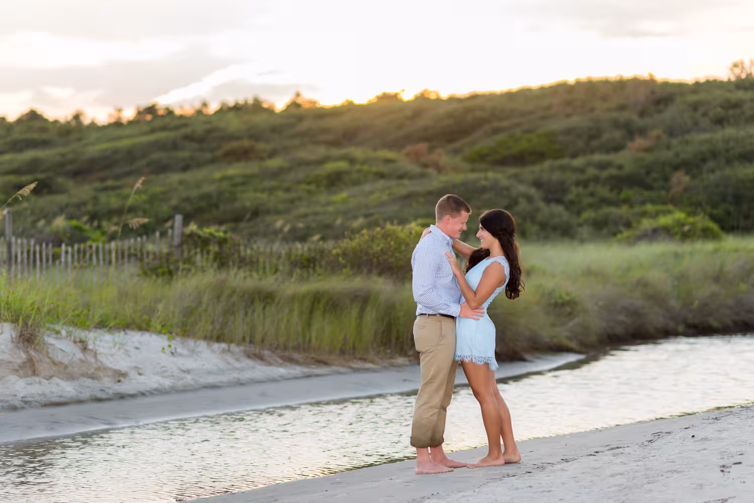 Surprise engagement proposal with the whole family at the Myrtle Beach State Park 26 Sunset engagement portrait in front of the dunes at the Myrtle Beach State Park