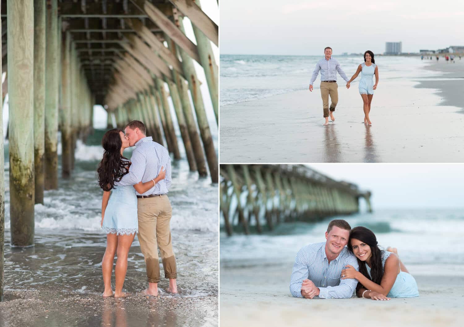 Couple laying in the sand in front of the pier