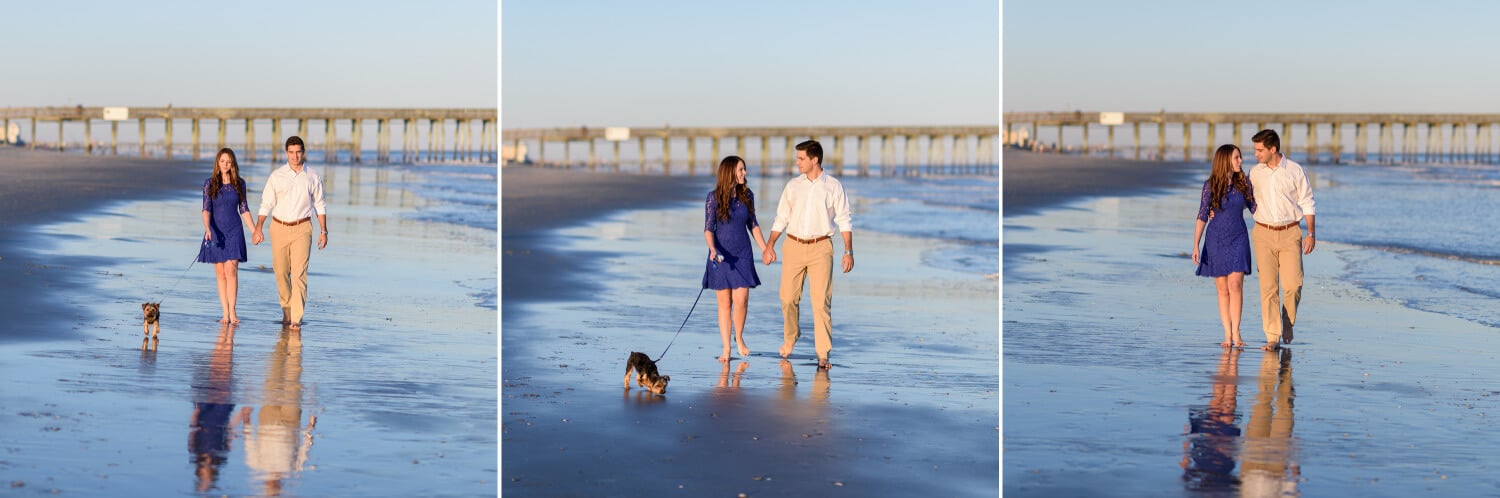 Couple walking their little dog down the beach at the Myrtle Beach
