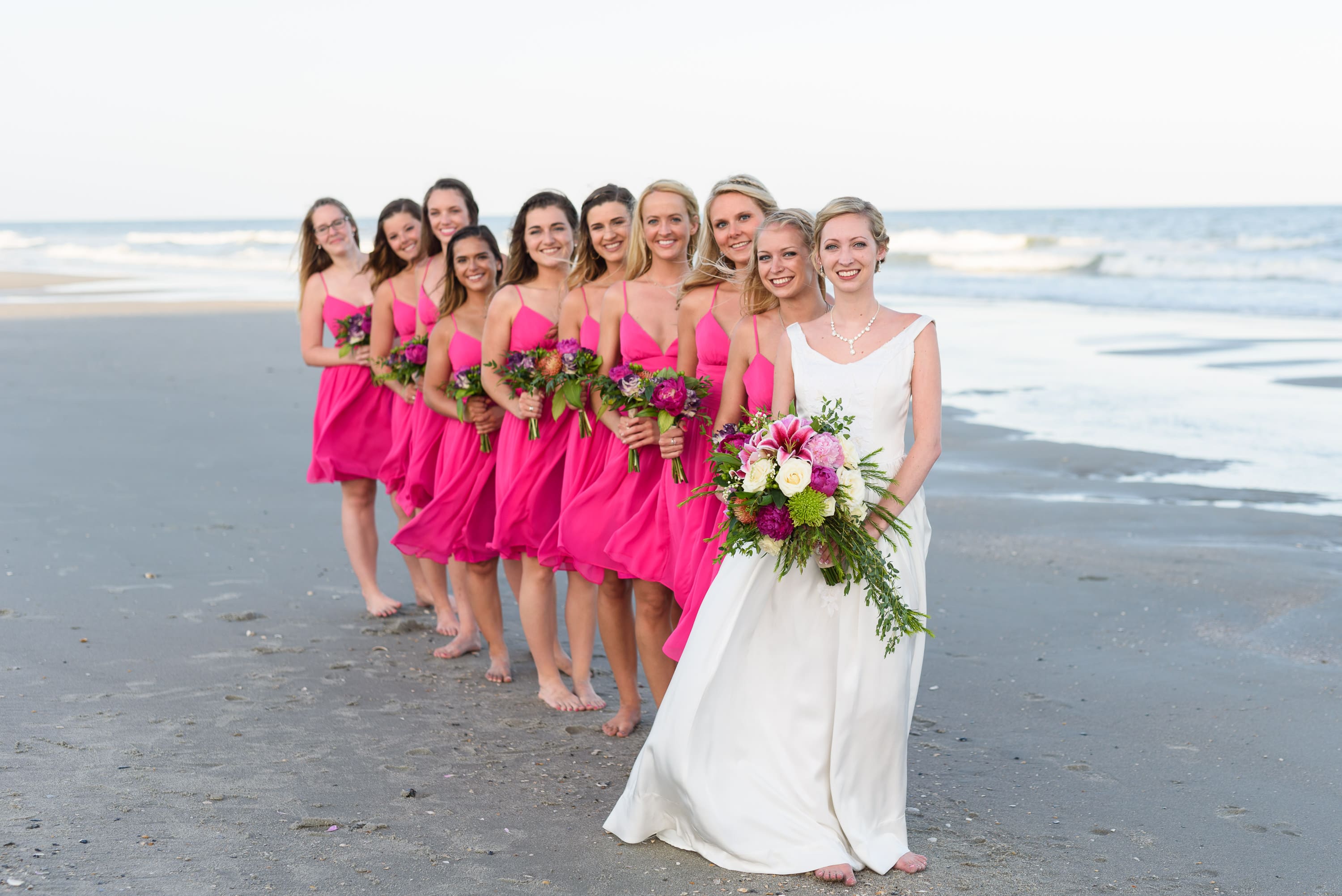 Bride standing in front of her bridesmaids -  Grande Dunes Ocean Club