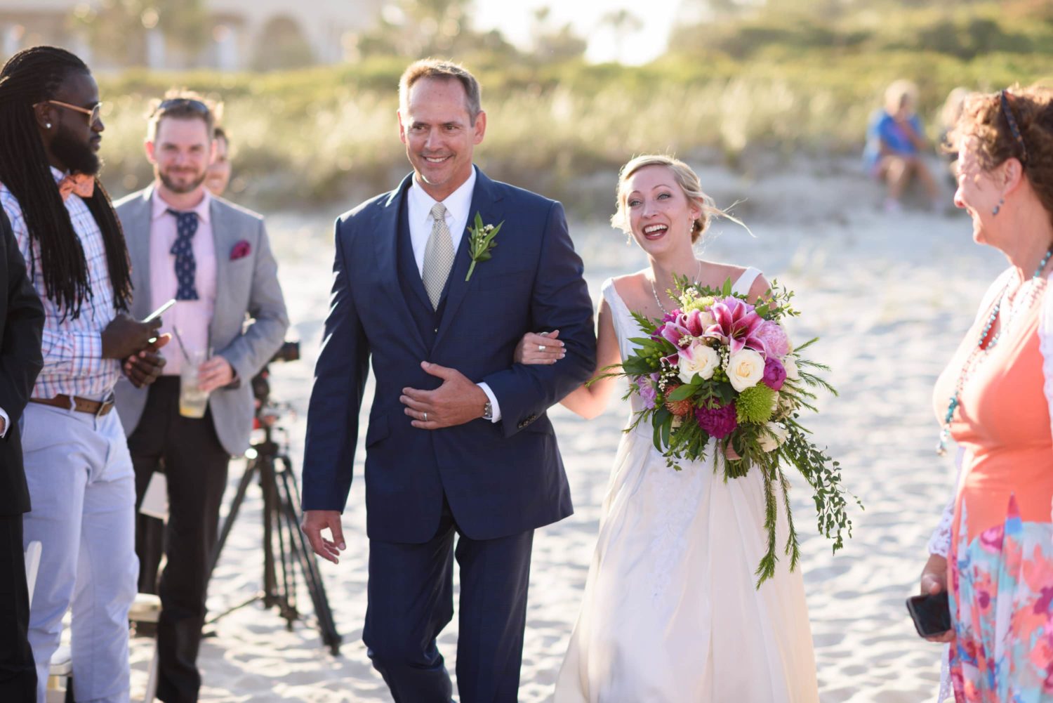 Bride walking towards ceremony with her father -  Grande Dunes Ocean Club