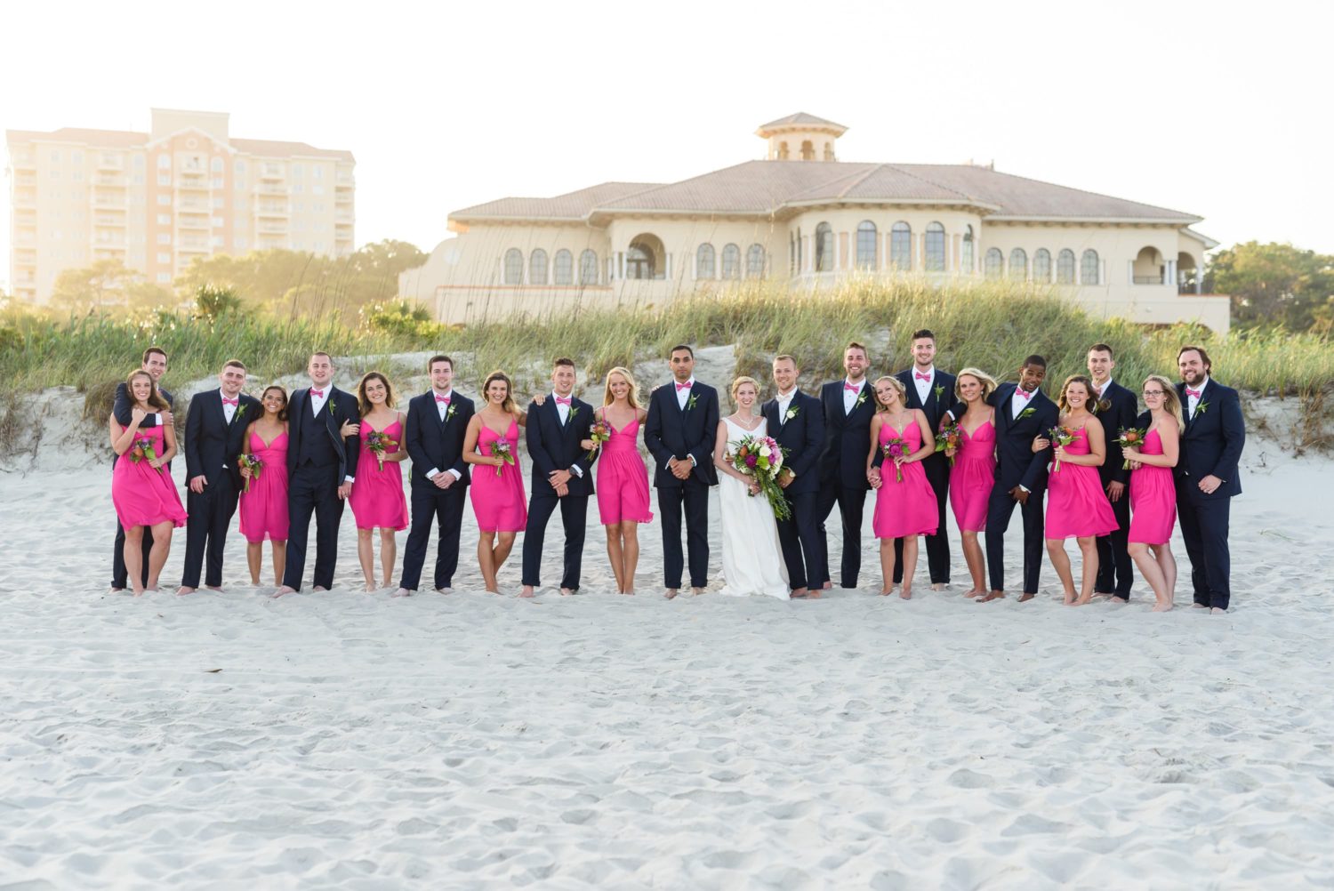 Huge bridal party in front of the dunes -  Grande Dunes Ocean Club