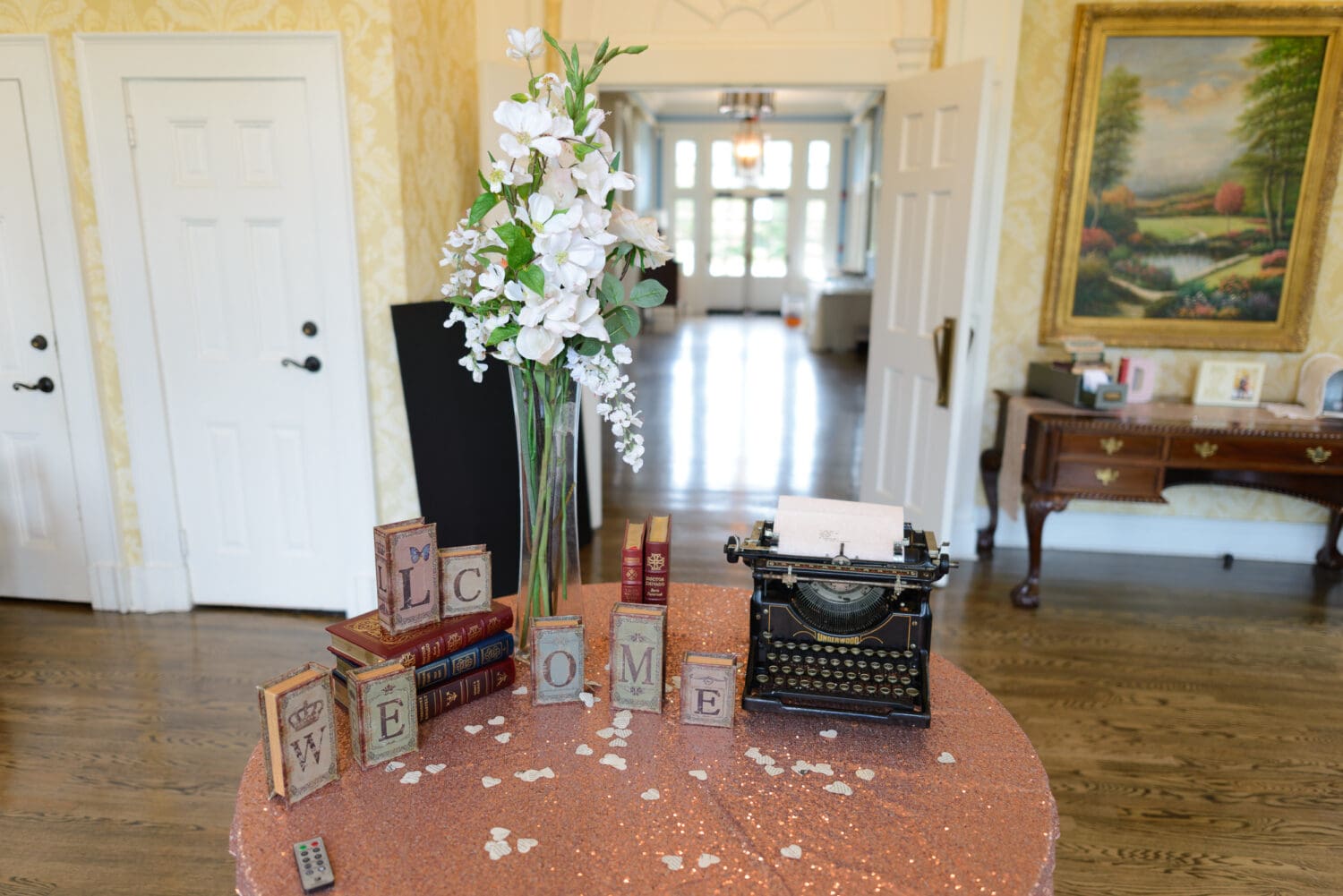 Entrance table with books and typewriter - Pine Lakes Country Club